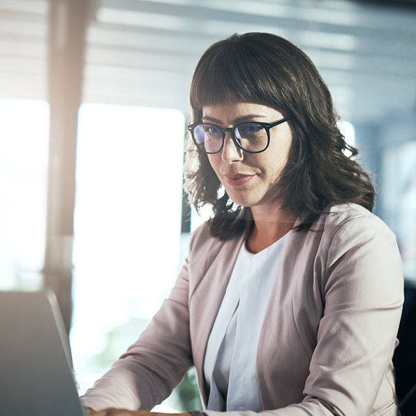 Person at laptop with glasses