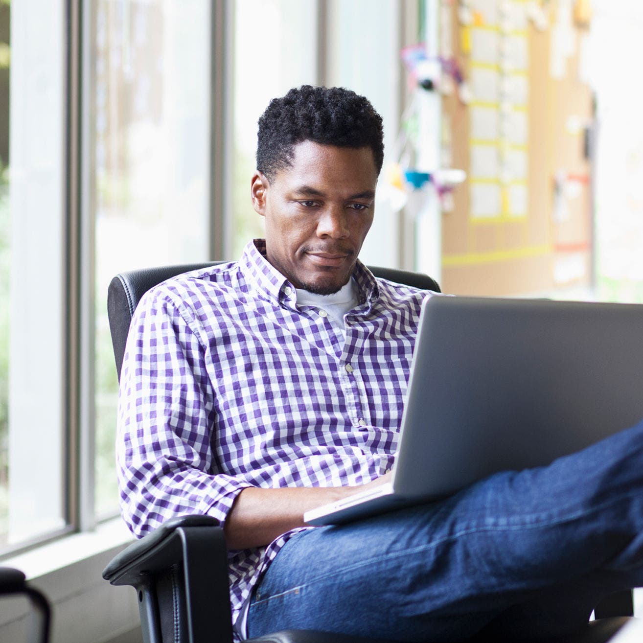 man using laptop