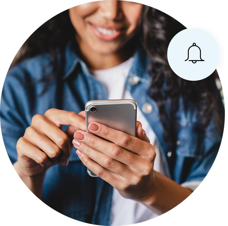 woman tapping screen on mobile phone