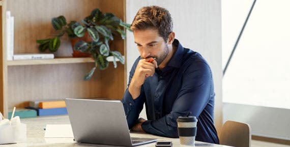 Man looking at laptop