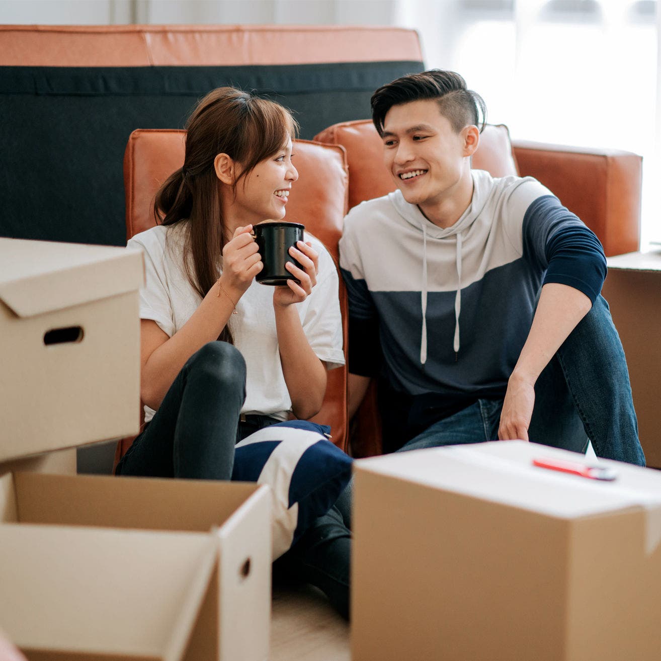 young couple unpacking