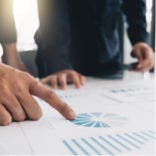 business people reviewing data