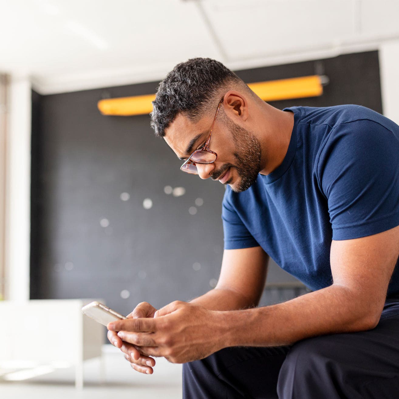 Man looking at smartphone
