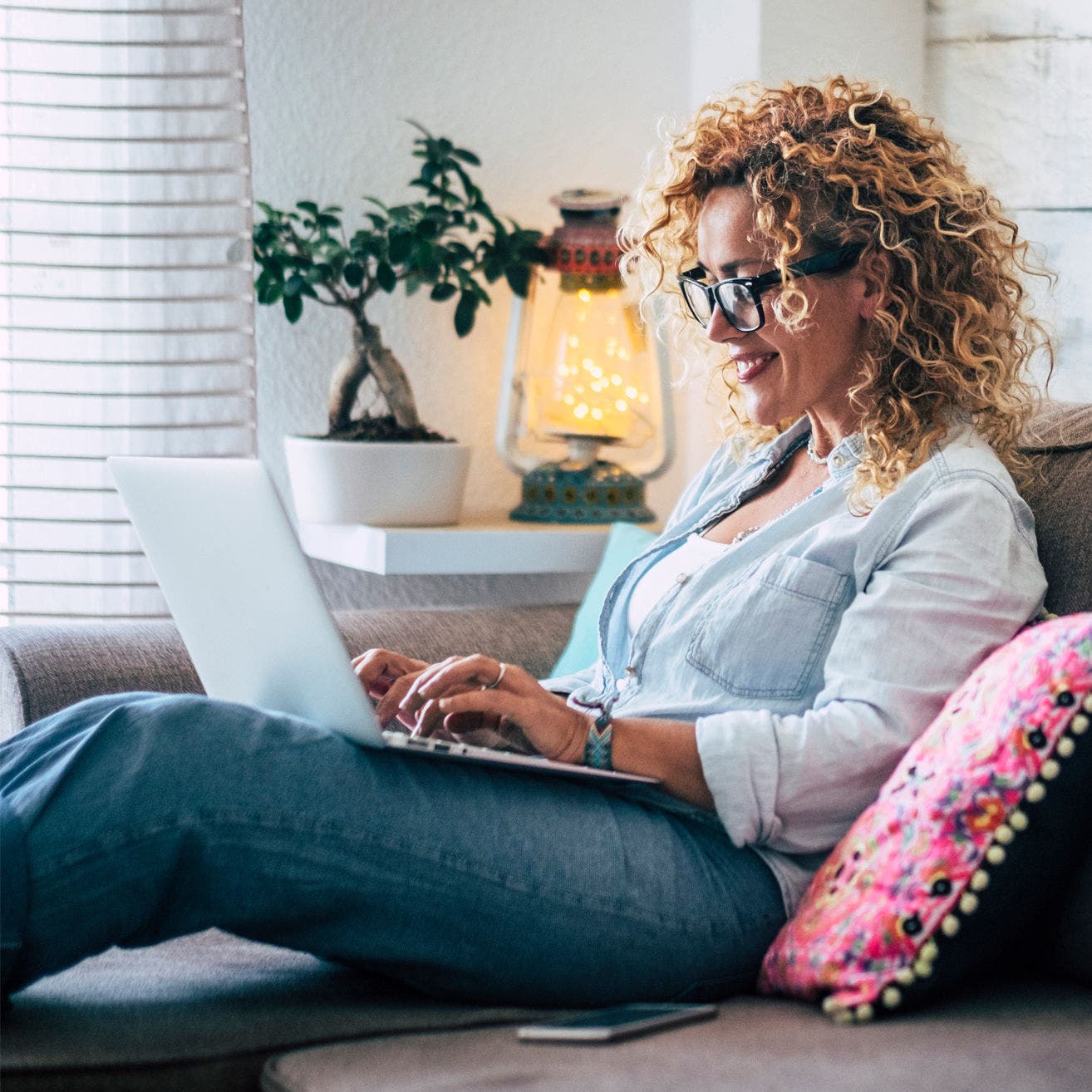 Woman using laptop at home