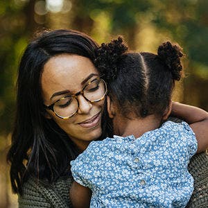 mom holding child