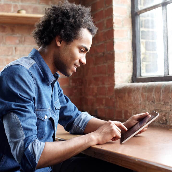 man using tablet