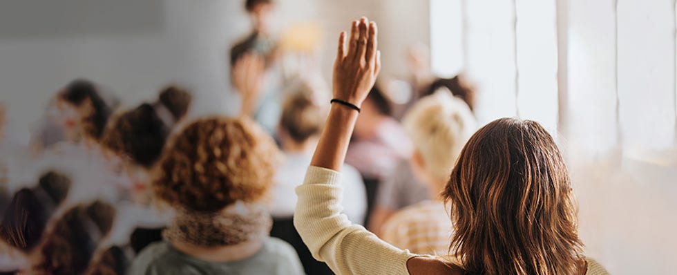 Lady raising her hand