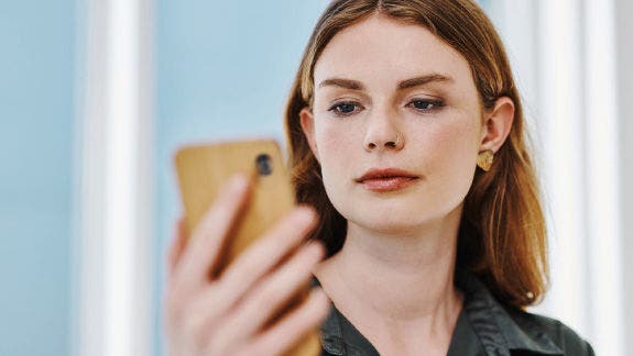 Woman looking at a mobile phone