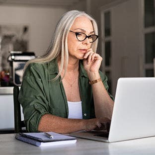 woman working from home on laptop