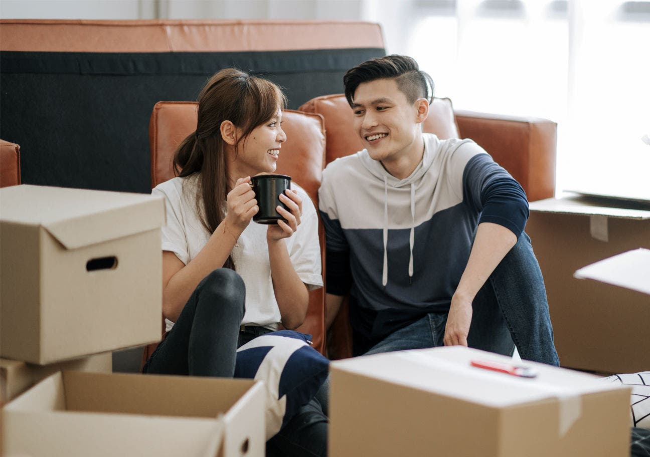 young couple unpacking
