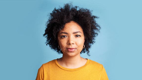 Woman with facial recognition grid.