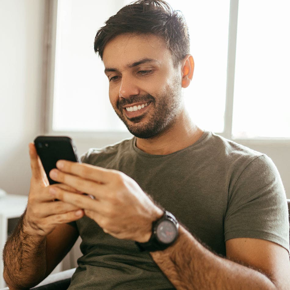 man using smartphone