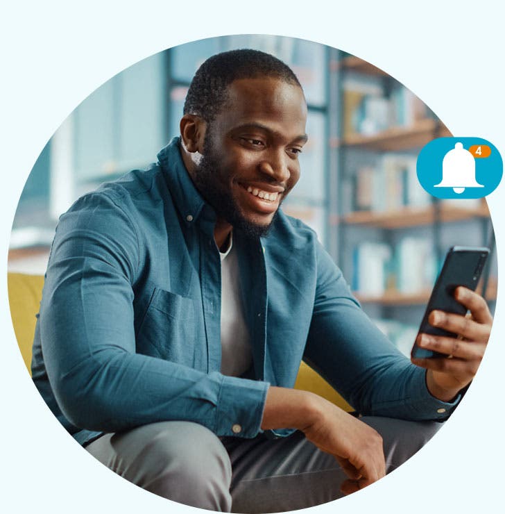 man reading notifications from TransUnion application 