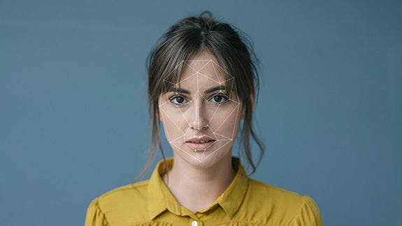 Woman facial recognition scan