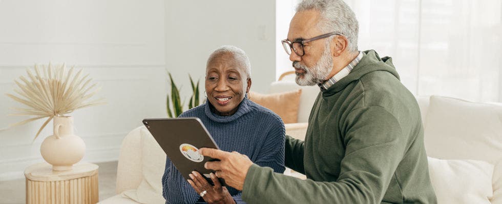 Couple looking at an ipad