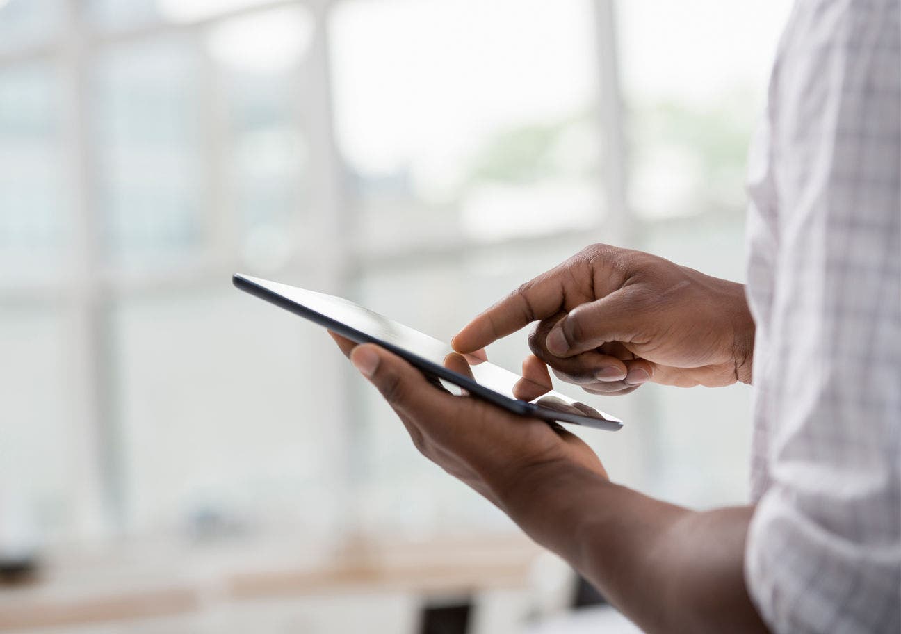 business man using tablet