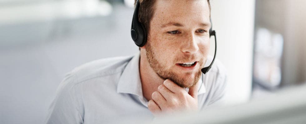 Man wearing headset making phone call