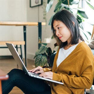 woman working on laptop
