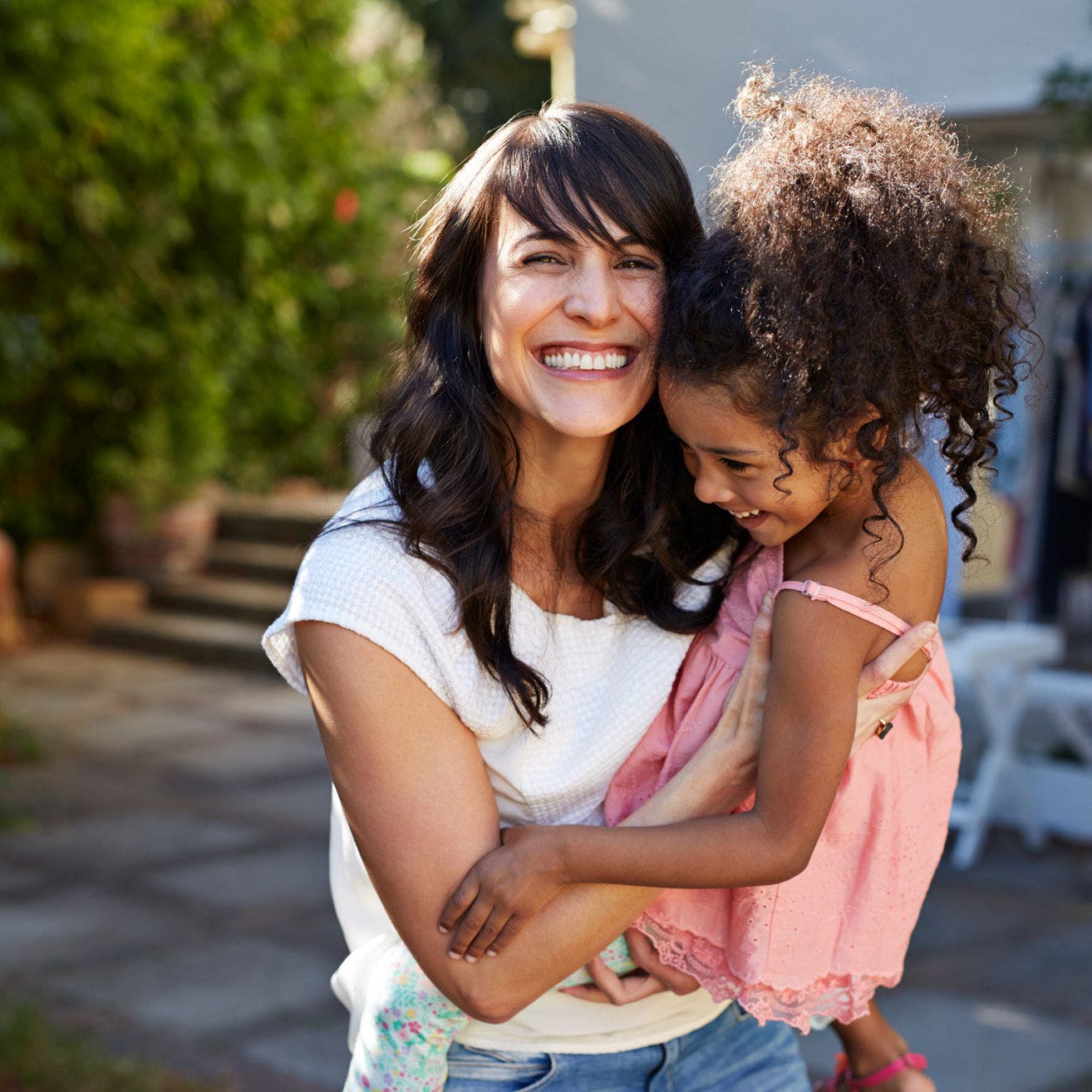 mother and daughter laughing