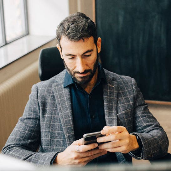 business man using smartphone