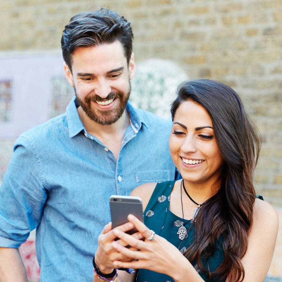 couple using smartphone