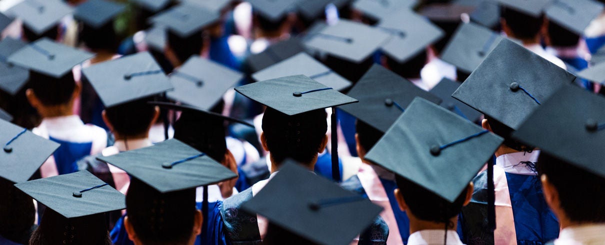 crowd of graduation caps