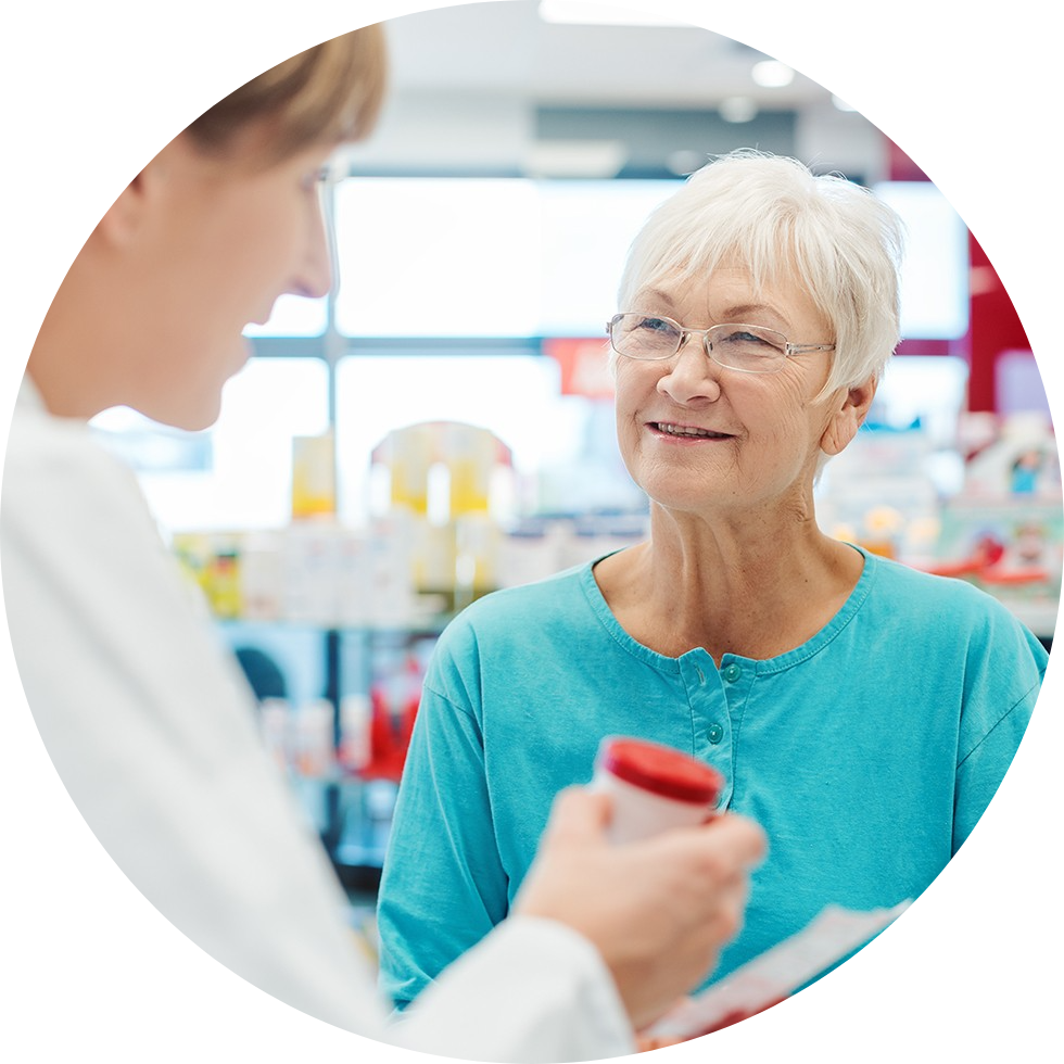 woman smiling at pharmacist
