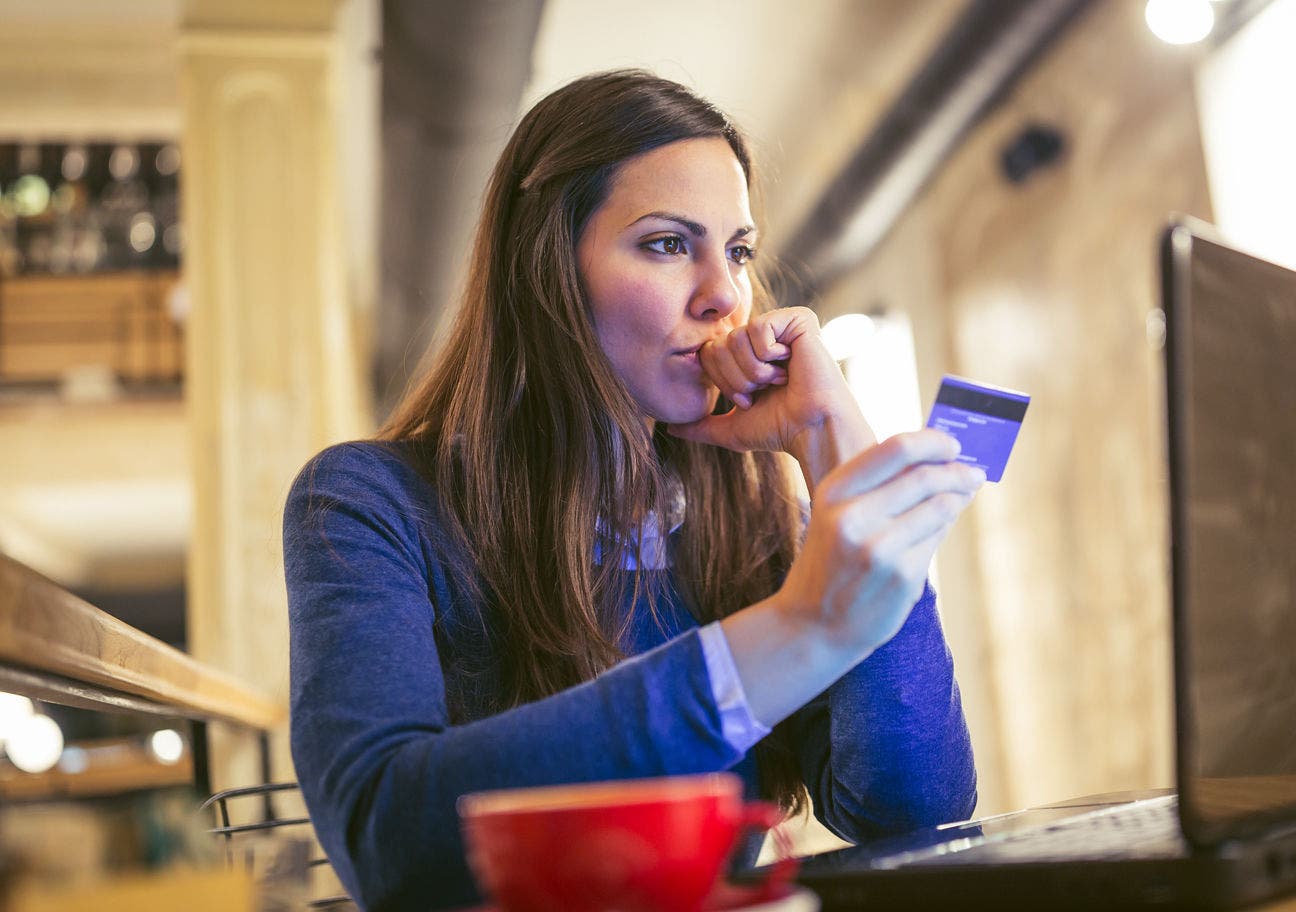 woman using credit card online