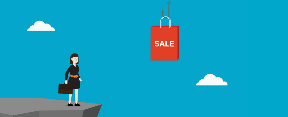 Person looking at "sale" sign with a hook in it. 