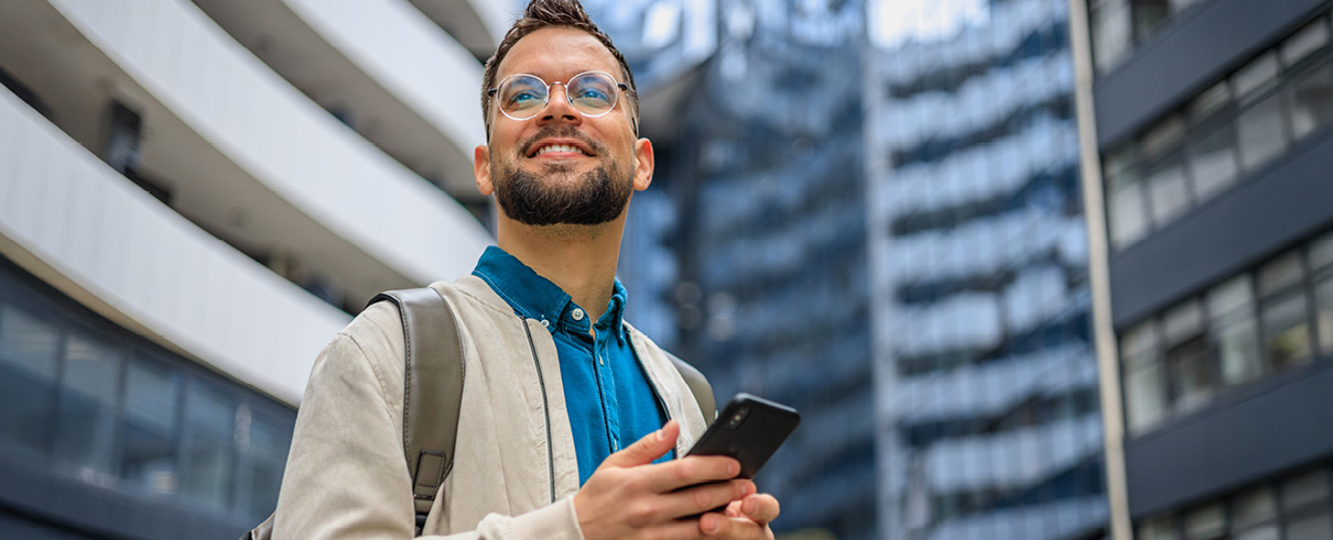 man looking at phone