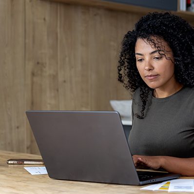 Woman on laptop.