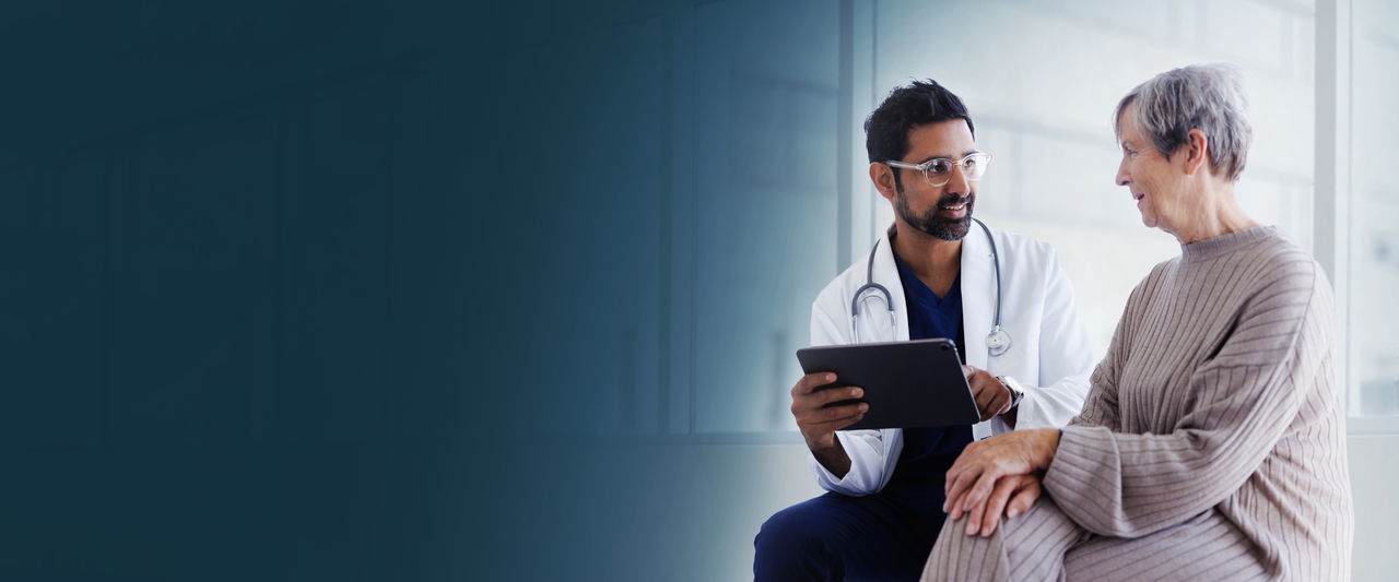 doctor with elderly woman