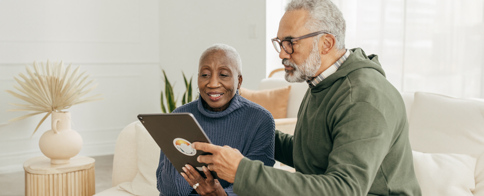 Couple looking at an ipad