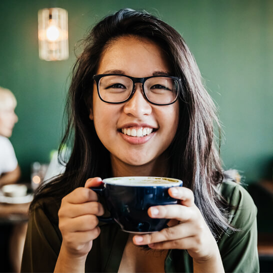 smiling woman in coffee shop