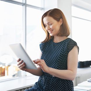 woman using tablet in office