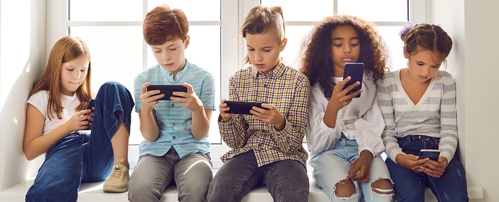 Children using mobile phones